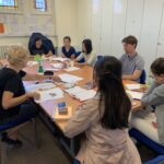 ESOL_table_faces_wide-e1565351776415